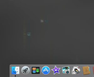 iMac の画面上ではドットが降って表示されている。